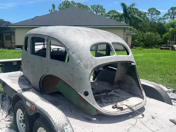 Classic sedan body sandblasted to bare metal on a trailer, Treasure Coast FL