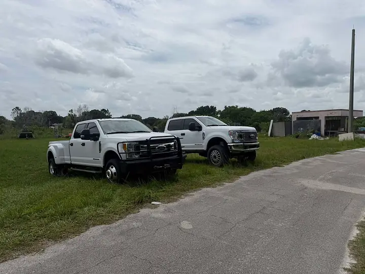 Crew trucks on a job site, Treasure Coast Mobile Sandblasting, Vero Beach FL