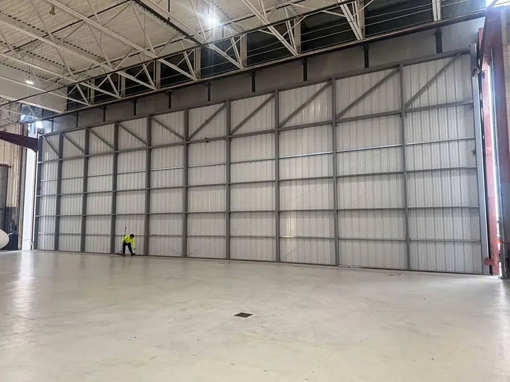 Hangar wall being painted, Treasure Coast Mobile Sandblasting, Vero Beach FL