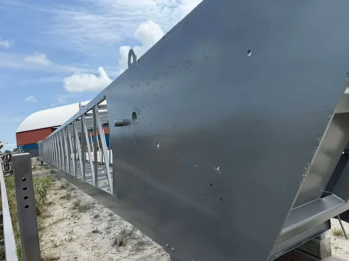 Sand mine conveyor and hopper sandblasted and coated gray by our crew