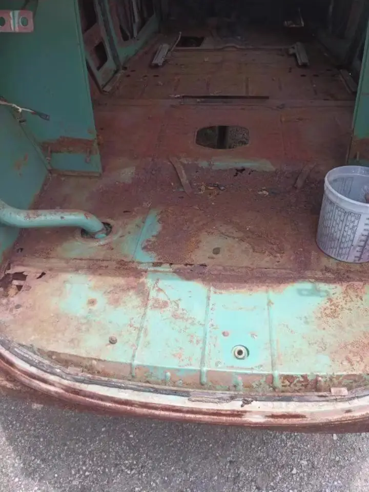 Rusted floor pan before